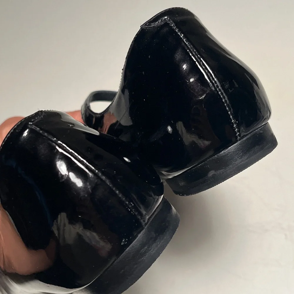 CHANEL Black Patent Leather Flats with Silver Floral Accents - Picture 3 of 14